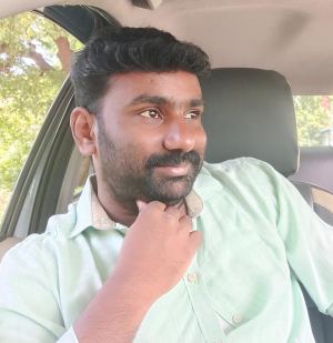 B.தாமோதரன்